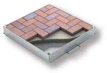 Ocelové a hliníkové poklopy pro zadláždění